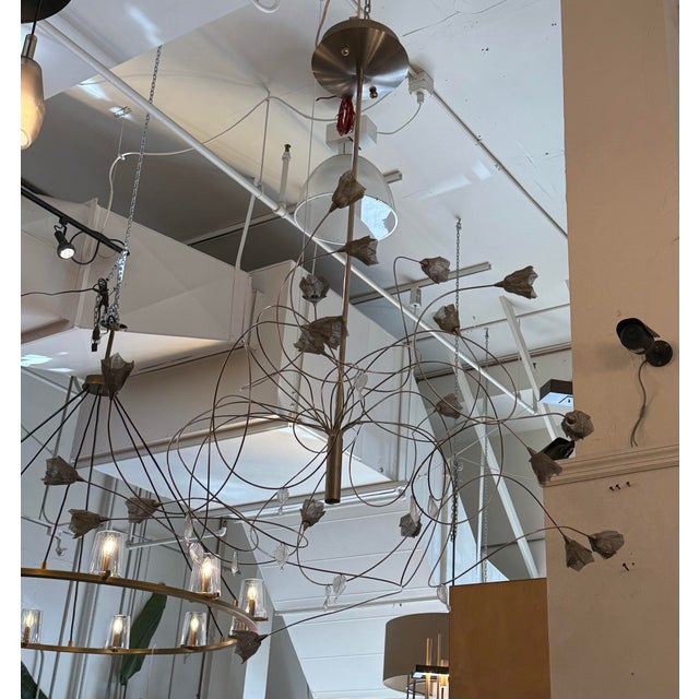 Design Plus Gallery presents the Breeze HL 20 Chandelier from Harco Loor Design. This sculptural chandelier has an...
