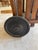 This is a wooden slat-construction rolling pull basket featuring a vertical handle, open slatted sides with crenellated...