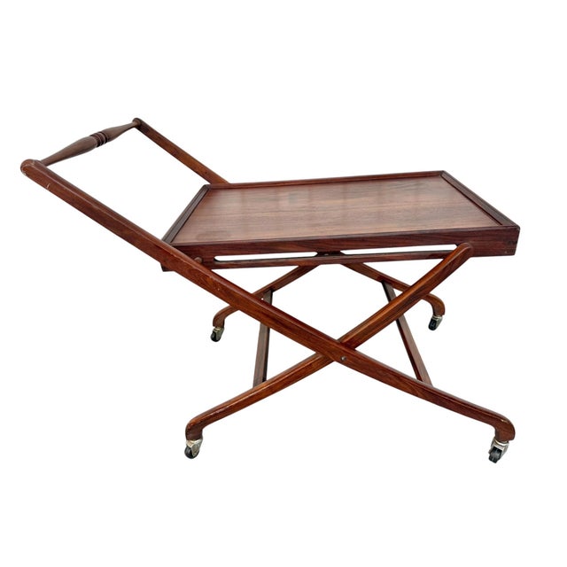 Bring timeless Scandinavian design into your home with this stunning Mid-Century Danish Modern teak folding serving cart,...