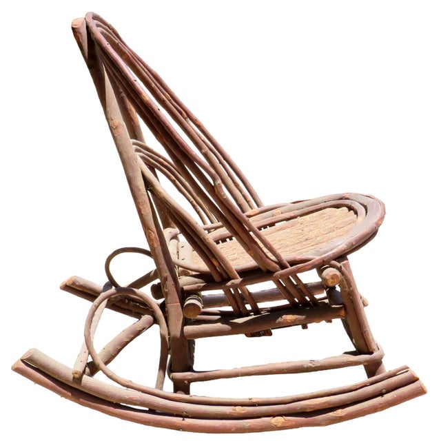 Bring storybook charm to a nursery, playroom, or rustic interior with this delightful antique children's twig rocking...