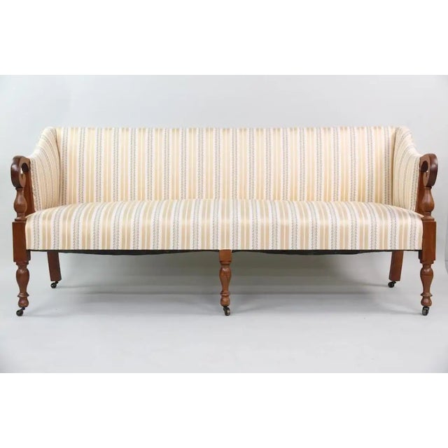 American Federal Sofa in the Sheraton Style. Early 19th Century with Scroll arms and turned legs. New England --upholstery...