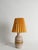 This elegant white and gold ceramic table lamp was produced by Fratelli Fanciullacci in Italy during the 1970s,...