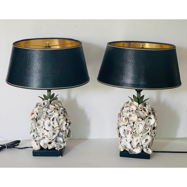 Grotto oyster shell pair for f lamps with custom shades.