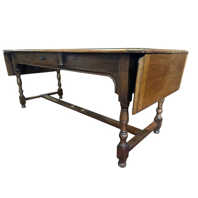 Beuatiful 19th century French Provincial desk/table with drop leaves. The combination of turned legs with stretchers and a...