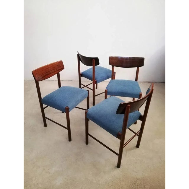 Four chairs datable between the 60s and 70s in Danish style. Solid structure made with precious woods such as mahogany and...