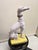 Charming terracotta greyhound statue. White glazed craquelure body with a stunning standout ribcage. Obedient in its...