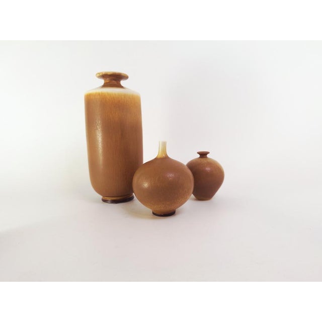 Elegant stoneware vase by Berndt Friberg for Gustavsberg, featuring a rich brown hare’s fur glaze. Signed with the...
