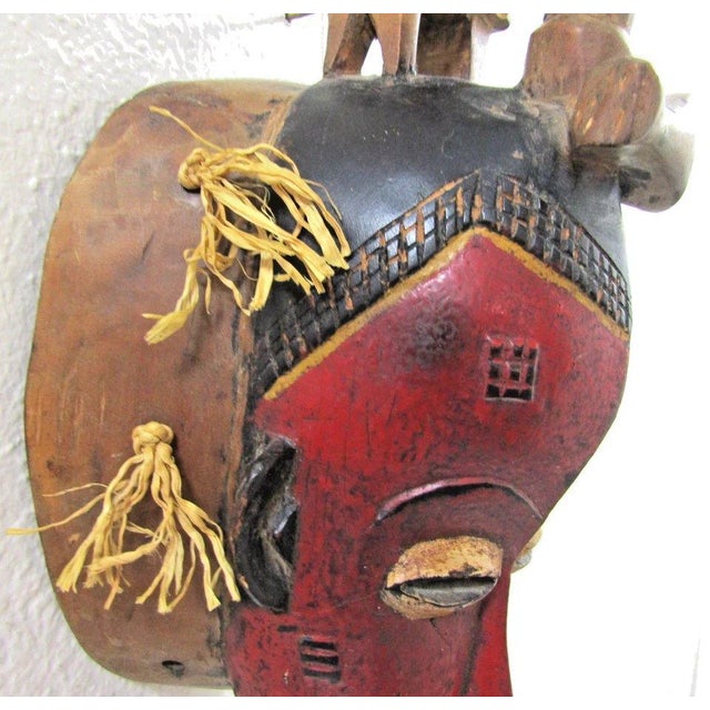 Antique Hand-Carved Guro Mask of the Ivory Coast Featuring a Seated Figure For Sale - Image 11 of 15