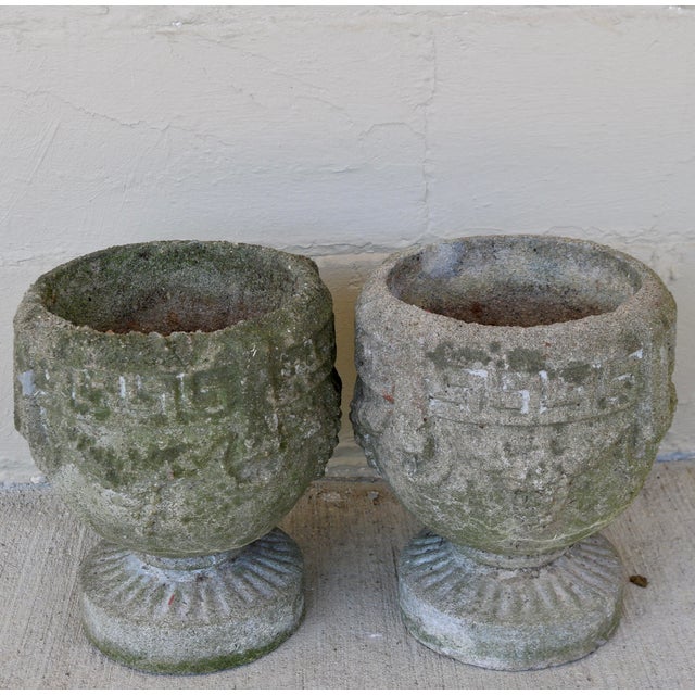 Add timeless classical charm to your home or garden with this striking pair of mid-century American cast concrete pedestal...