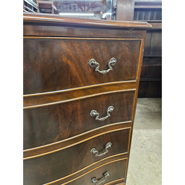 Tall flame mahogany 6 drawer chest of drawers on splay feet labeled made in 1979