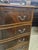 Tall flame mahogany 6 drawer chest of drawers on splay feet labeled made in 1979