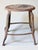 Industrial metal stool Height 44 cm Diameter 38 cm Leg width approximately 41.5 cm Raw metal Signs of wear and age.