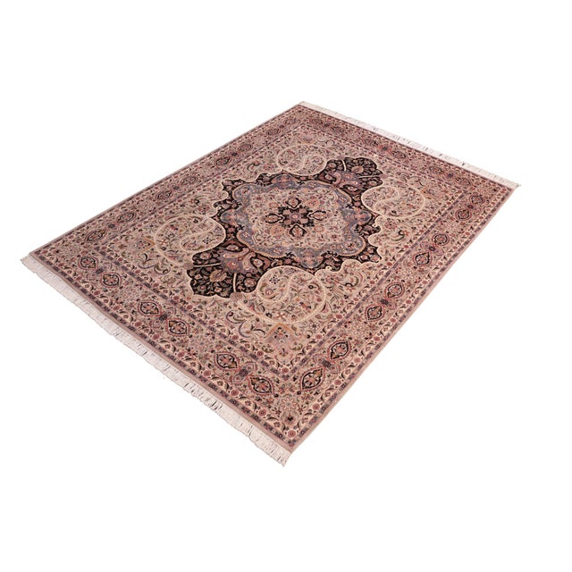 Designed with mesmerizing intricacy and gorgeous color palette, this hand-knotted masterpiece demonstrates the beauty and...