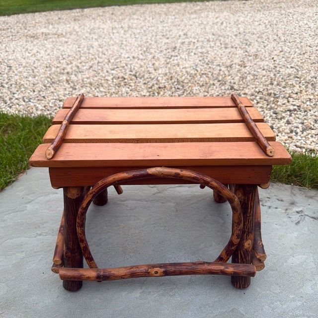 Fantastic artisan made rustic Adirondack style wood and twig footstool/stand. The bentwood arches give this piece a great...