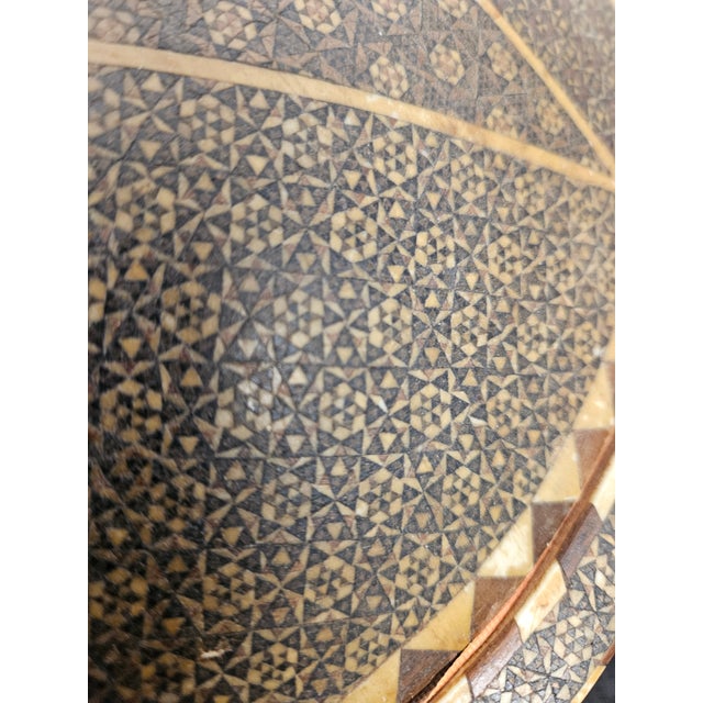 Beautiful Moroccan Star Inlaid Box with Bone, ebony and other woods. Lined in orange satin sitting on tiny brass fèet