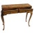 This is a burl writing table with Queen Anne styling. It has heavy brass hardware and is marked on the inside. It opens...