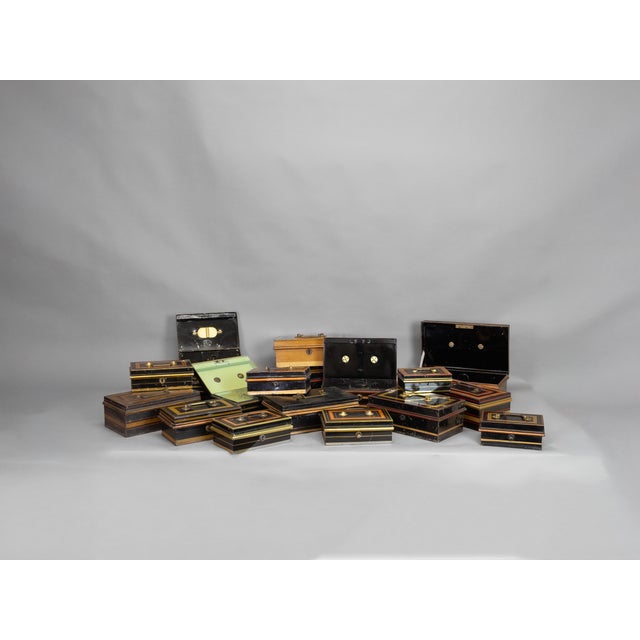 Collection of 18 tin money boxes. Circa 1950.