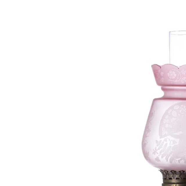Lighting - Oil lamp; in opaline glass. 20th century Europe; in opaline glass in shades of pink and painted with floral...