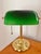 Beautiful banker's desk lamp with green Emeraldite shade and drawstring ball pull. A classic and traditional touch. Most...