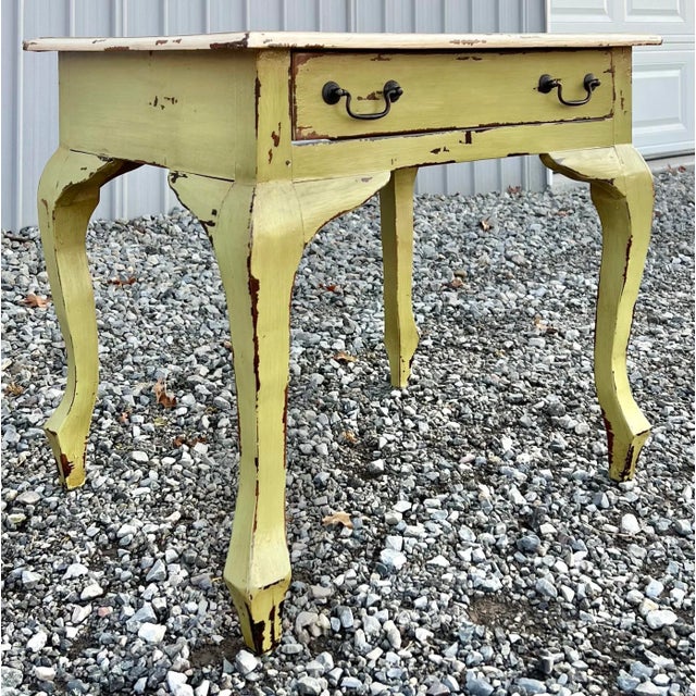 Great little French country farmhouse style accent side table. Single drawer. Finished in a distressed and worn apple...