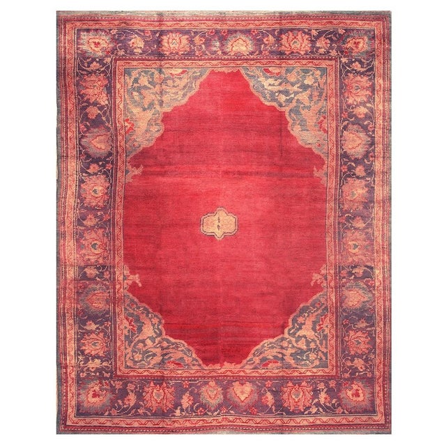 "This is a spectacular and exceptionally rare oversized antique European Donegal Arts & Crafts rug, Hand-knotted circa...