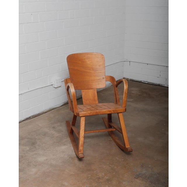 This Norwegian "Aaslid" Rocking Chair with its striking chess-patterned seat epitomizes the elegance and craftsmanship of...