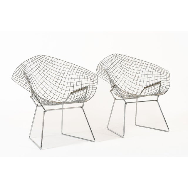 This pair of vintage mid century modern diamond wire lounge chairs designed by Harry Bertoia (American, 1915-1978) for...
