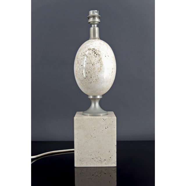 Bring a touch of timeless elegance to your interior with this exceptional living room lamp, designed by the renowned...