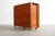 This is such a great find! It's a 1960's mid century modern teak drop leaf hide-a-way dining Table w/ 4 folding chairs...