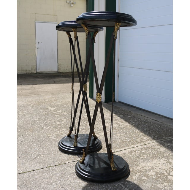 Very stylish neo classical pedestals attributed to Maitland-Smith. These would be a stunning addition to any home.
