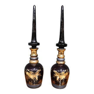 Early 20th Century Royal Purple Art Glass Decanters With Gold Horse Overlay - Pair For Sale