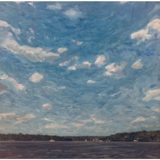 Dancing Clouds by Jim Beckner | Oil Painting of a blue sky with clouds over a lake For Sale
