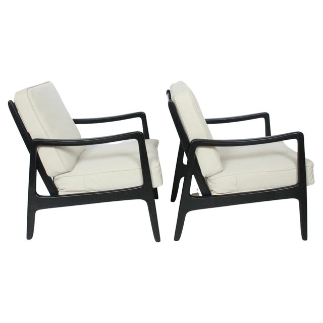 Danish Modern pair of solid ebonized Cuban Mahogany lounge armchairs by Ole Wanscher designed for France and Daverkosen...