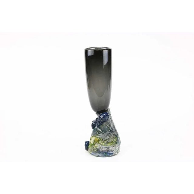 Vesuvius Transcontinental, a unique art glass vase by the Swedish glass artist Björn Stern, crafted in the year 1989. This...