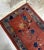 Handmade antique Art Deco Chinese rug in red shade with greyish border. The rug has traditional floral Art Deco design. It...