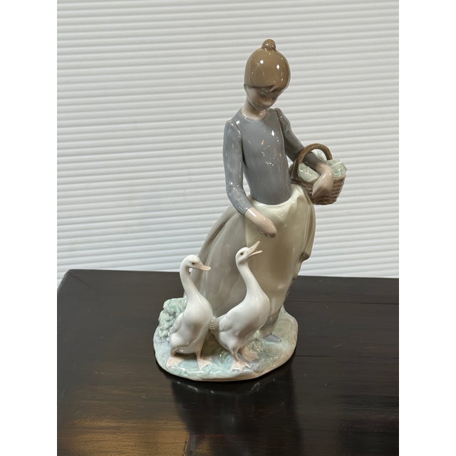 Design Plus Gallery presents the Porcelain Figurine Pacing the Ducks by Fulgencio García for Lladró. It features a...
