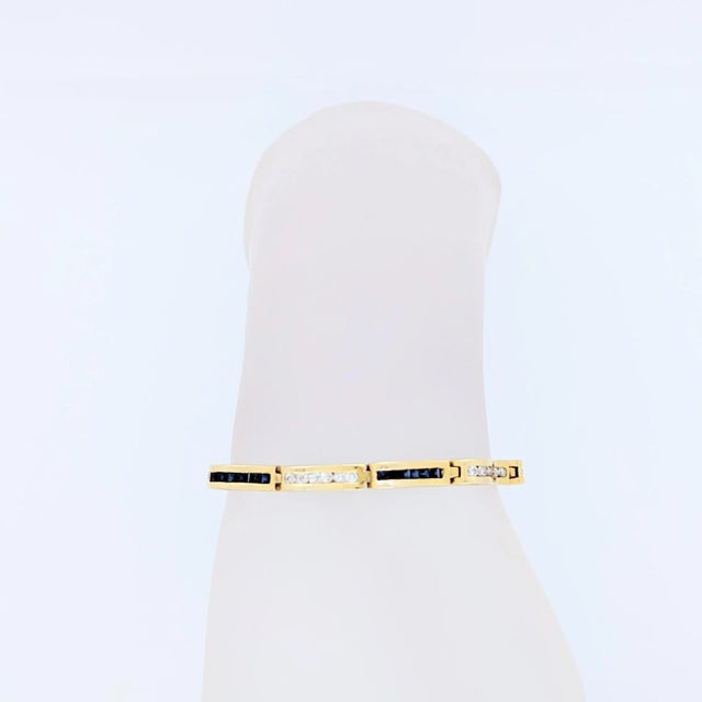 Beautiful blue sapphire squares and white diamond rounds. Handmade in 14k yellow gold. Length is 7". Metal: Yellow Gold...