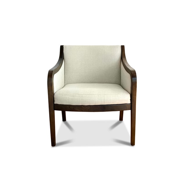 A vintage Gunlocke lounge chair that has been restored using a linen blend light beige fabric. The Gunlocke chair features...