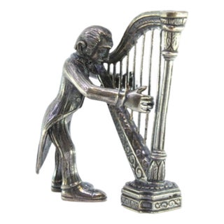 Silver Figure of Musician Playing the Harp For Sale
