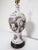 A rare porcelain bottle (circa 1840-1850) hand painted with images of stock (jugs, pitchers, tureens and whale oil lamps)...