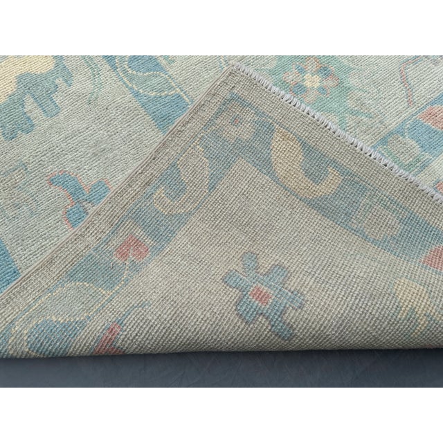 Faded Oushak Wool Rug – Ivory/Blue – 8′9″ × 12′0″ For Sale - Image 9 of 9