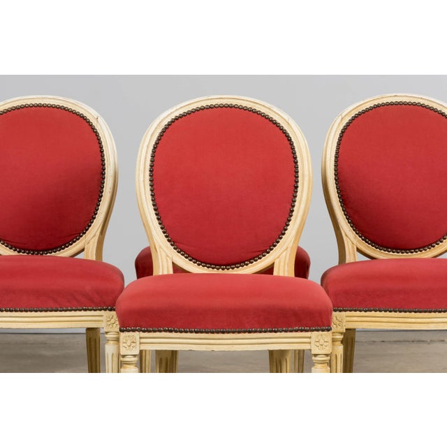 A lovely set of eight early 20th century French Louis XVI style dining chairs, sourced in Provence. Each chair is hand-...