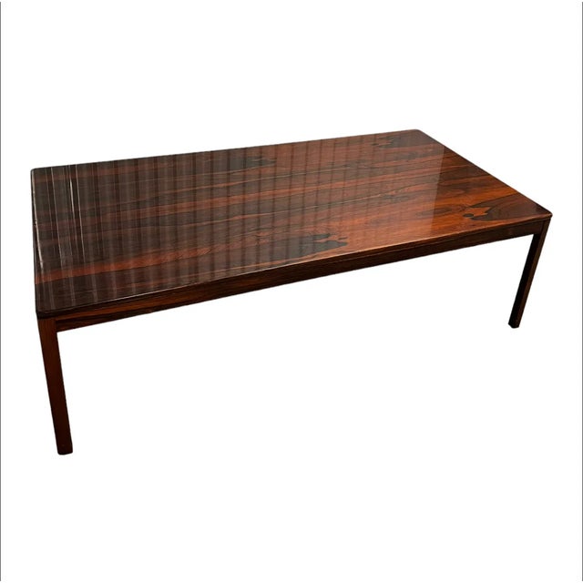 19"H x 63"L x 31 1/2"W A minimalist designed coffee or center table. Straight legs and clean lines. Designed by Brode...