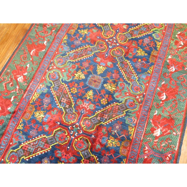A spirited gallery-sized Karabagh possible armenian rug? with a zeychour keyhole design. Lustrous wool and jewel toned...