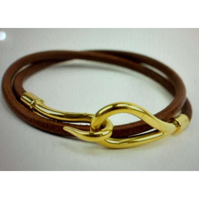 Hermes Gold Plated Elephant Cadena Lock Charm . Length 1.5" Width 1". With Hermes Gold plated Clasp, Leather...