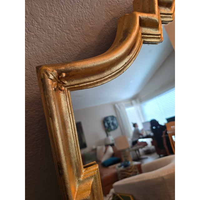 Beautiful gold-gilded wood mirror is perfect over the fireplace, as an entry mirror over a console table, a dresser or...