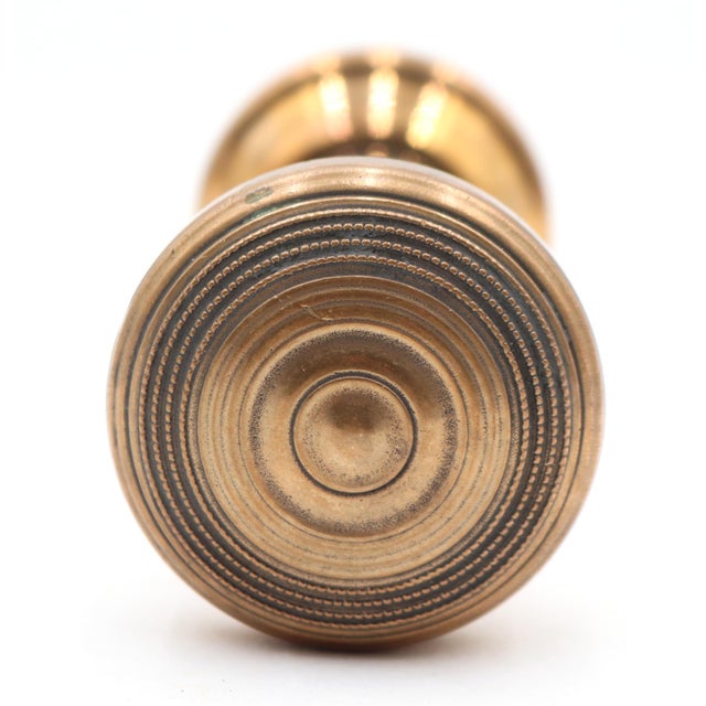 Antique passage concentric brass door knobs made by P & F Corbin in the 1913 catalog. It was part of a special design for...