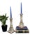 A charming pair of hand-painted Portuguese ceramic candlesticks decorated in a whimsical woodland motif with birds, dog,...
