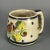Estate sale find! Beautifully preserved hand-painted Tonala coffee mug with birds and flowers. The yellow and cobalt glaze...