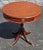 An Early 20th Century Genuine Mahohany Pedestal Quadpod Single drawer Drum Table with brass paw feet. Measures 26" in...